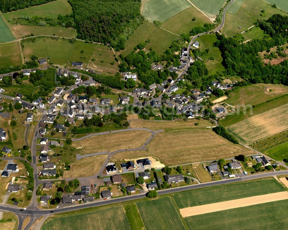 Laubach from above - View of Laubach in the state of Rhineland-Palatinate. The borough and municipiality is located in the county district of Cochem-Zell in the Eifel region. The official tourist resort is surrounded by agricultural land, meadows and forest