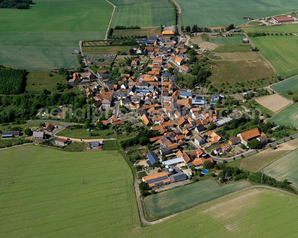 Aerial image Lettweiler - View of the borough and municipiality of Lettweiler in the state of Rhineland-Palatinate. The agricultural borough is located in the county district of Bad Kreuznach. Surrounded by fields, hills and forest, the village is located in the mountain range of Northern Palatinate. Lettweiler is widely known as a wine-growing town and is part of the wine-growing region of Nahe