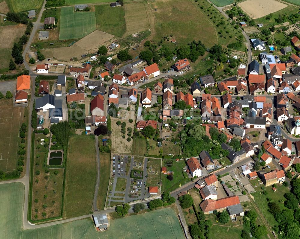 Lettweiler from above - View of the borough and municipiality of Lettweiler in the state of Rhineland-Palatinate. The agricultural borough is located in the county district of Bad Kreuznach. Surrounded by fields, hills and forest, the village is located in the mountain range of Northern Palatinate. Lettweiler is widely known as a wine-growing town and is part of the wine-growing region of Nahe