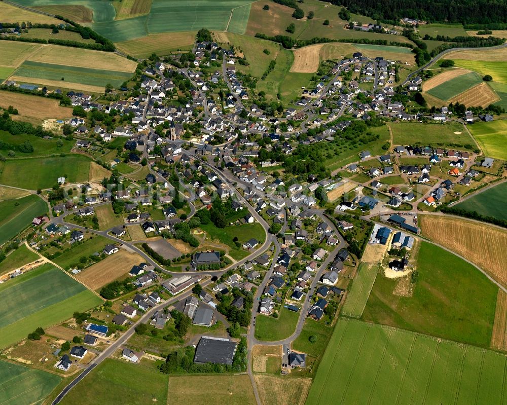 Masburg from above - View of Masburg in the state of Rhineland-Palatinate. The borough and municipiality is located in the county district of Cochem-Zell in the Eastern Eifel Region. Masburg includes several hamlets and estates. It is surrounded by agricultural land and meadows and is widely wooded