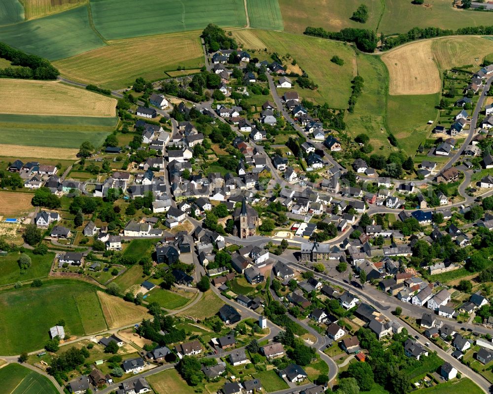 Masburg from the bird's eye view: View of Masburg in the state of Rhineland-Palatinate. The borough and municipiality is located in the county district of Cochem-Zell in the Eastern Eifel Region. Masburg includes several hamlets and estates. It is surrounded by agricultural land and meadows and is widely wooded