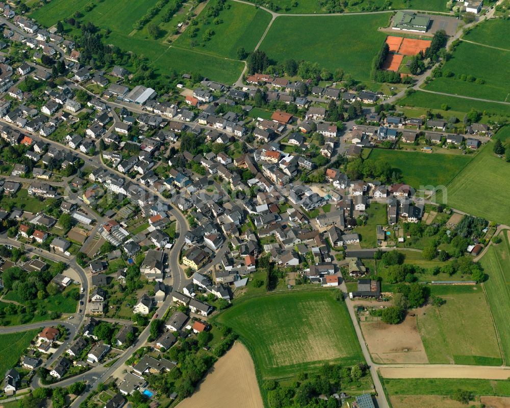 Aerial photograph Melsbach - View of Melsbach in the state of Rhineland-Palatinate. The borough and municipiality is located in the county district of Neuwied, in the foothills of the Westerwald forest, in the Nature Park Rhine-Westerwald and in the area of the Neuwieder Becken. It consists of several single family houses and residential areas and is a rural locality