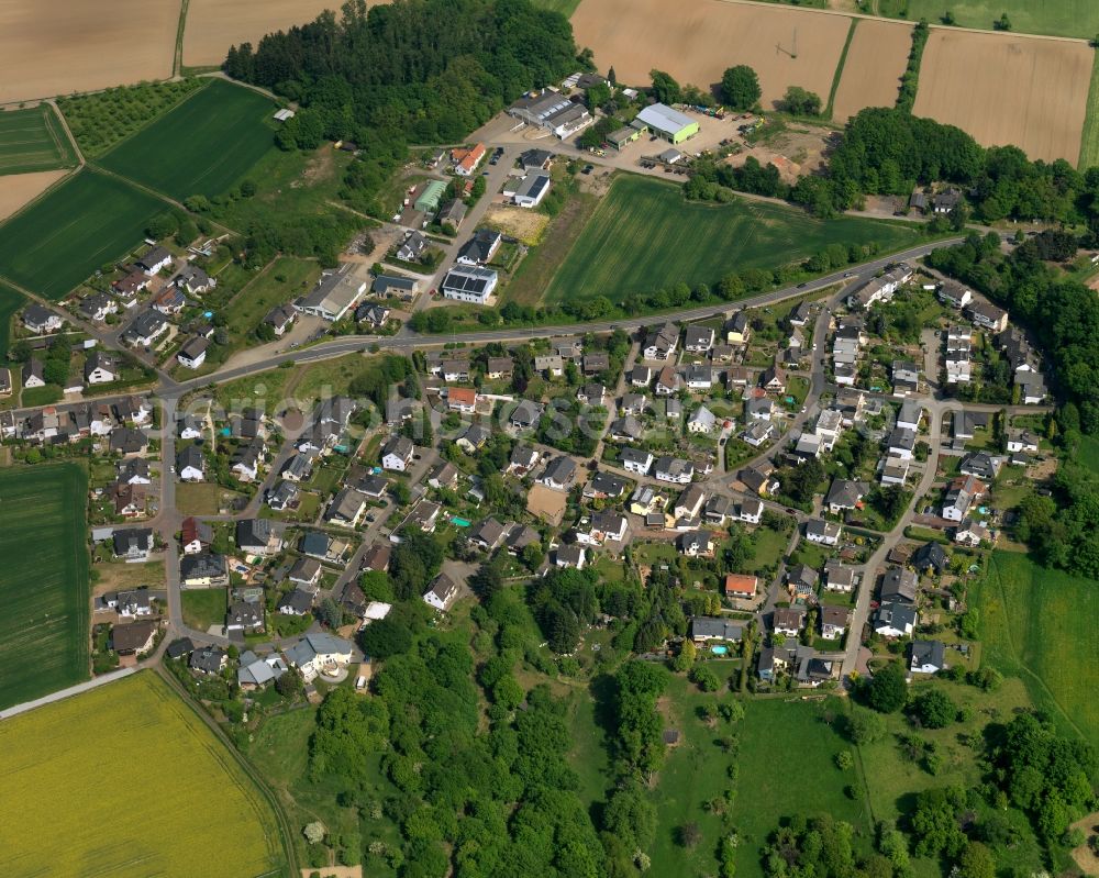 Aerial photograph Melsbach - View of Melsbach in the state of Rhineland-Palatinate. The borough and municipiality is located in the county district of Neuwied, in the foothills of the Westerwald forest, in the Nature Park Rhine-Westerwald and in the area of the Neuwieder Becken. It consists of several single family houses and residential areas and is a rural locality