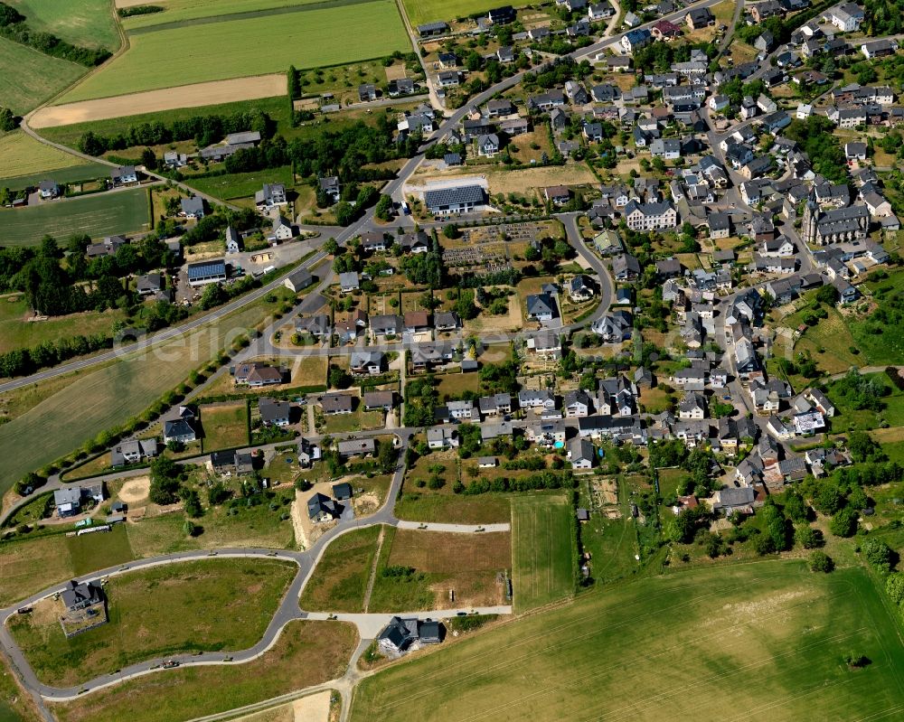 Müllenbach from above - View of Muellenbach in the state of Rhineland-Palatinate. The borough and municipiality is located in the county district of Cochem-Zell in the Eifel region. It is surrounded by agricultural land, meadows and forest