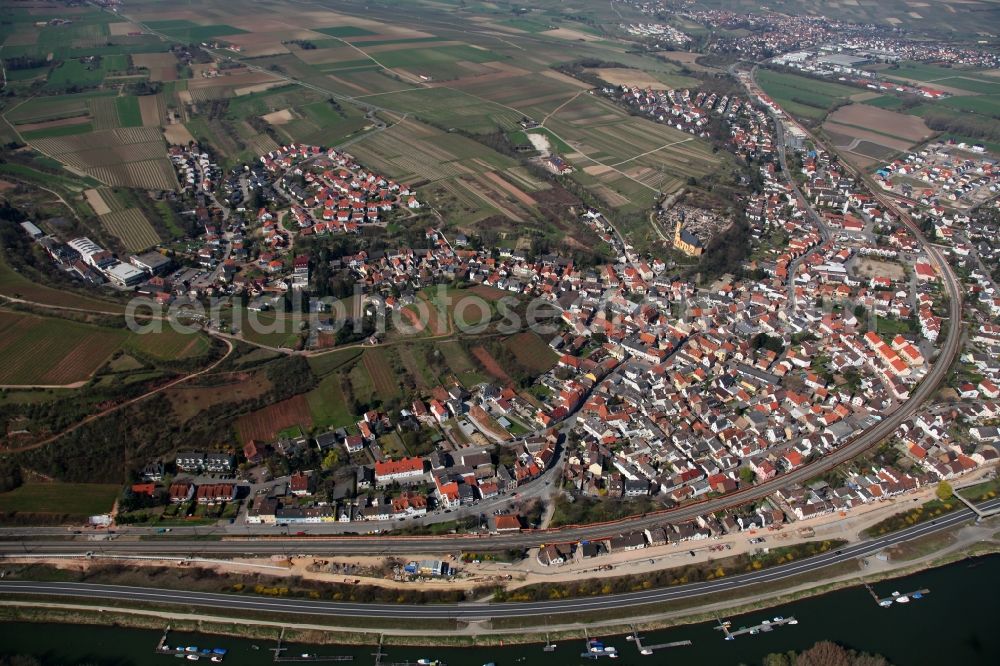 Nackenheim from above - View of Nackenheim in the state of Rhineland-Palatinate. The borough and municipiality is located in the county district of Mainz-Bingen, on the left riverbank of the Rhine. The official tourist resort is an important wine-growing village in the Rhine Hesse region and surrounded by fields and vineyards