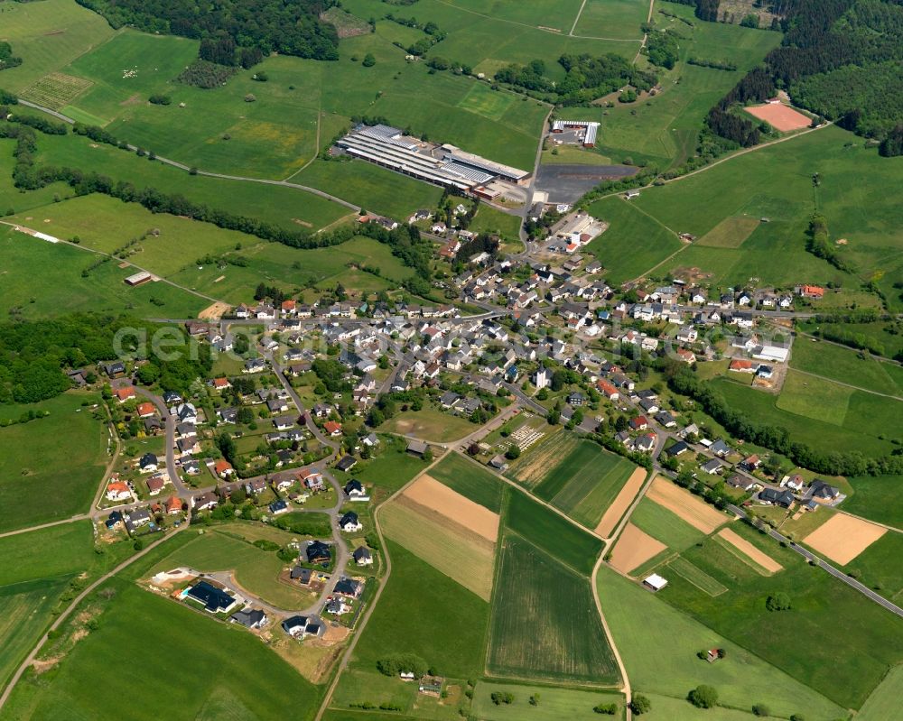 Neunkirchen from the bird's eye view: View of the borough of Neunkirchen in the state of Rhineland-Palatinate. The borough is located in the county district and region of Westerwald. The residential village is surrounded by fields and meadows