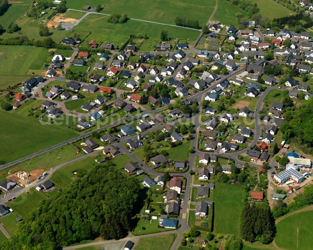 Aerial image Neustadt / Westerwald - View of the borough of Neustadt/Westerwald in the state of Rhineland-Palatinate. The borough is located in the county district and region of Westerwald. The residential village is surrounded by fields and meadows