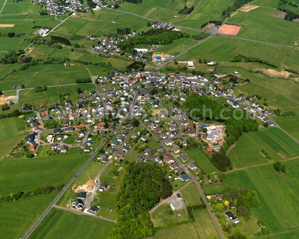 Aerial photograph Neustadt / Westerwald - View of the borough of Neustadt/Westerwald in the state of Rhineland-Palatinate. The borough is located in the county district and region of Westerwald. The residential village is surrounded by fields and meadows