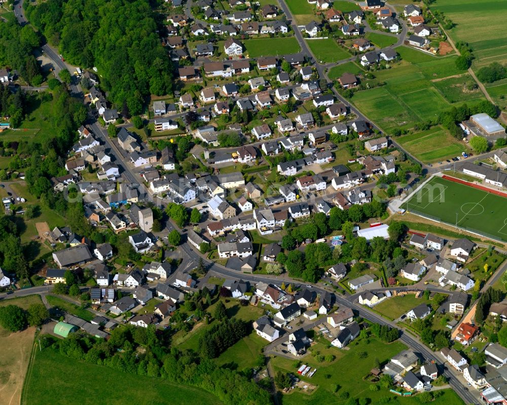 Niederahr from the bird's eye view: View of Niederahr in the state of Rhineland-Palatinate. The borough and municipiality is located in the county district of Westerwaldkreis in the low mountain range of Westerwald. Niederahr is surrounded by agricultural land, gravel pits and meadows and located on Ahrbach creek