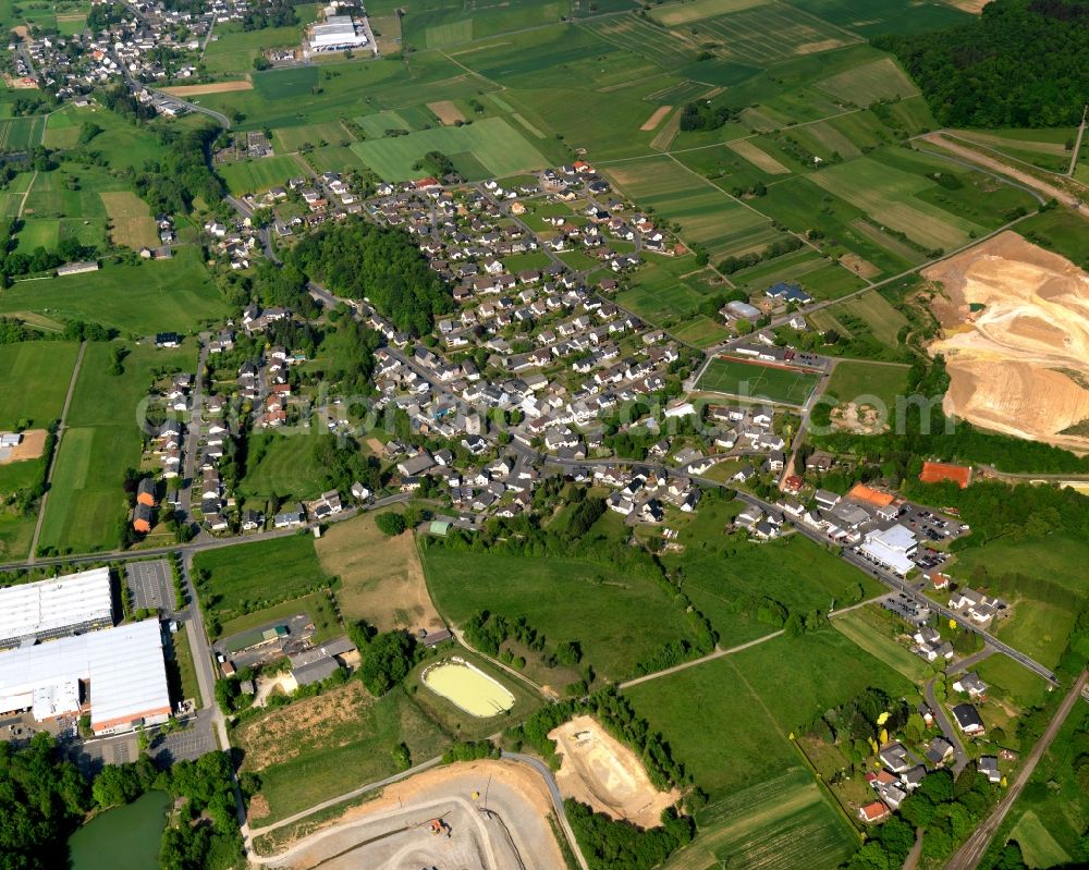 Aerial image Niederahr - View of Niederahr in the state of Rhineland-Palatinate. The borough and municipiality is located in the county district of Westerwaldkreis in the low mountain range of Westerwald. Niederahr is surrounded by agricultural land, gravel pits and meadows and located on Ahrbach creek