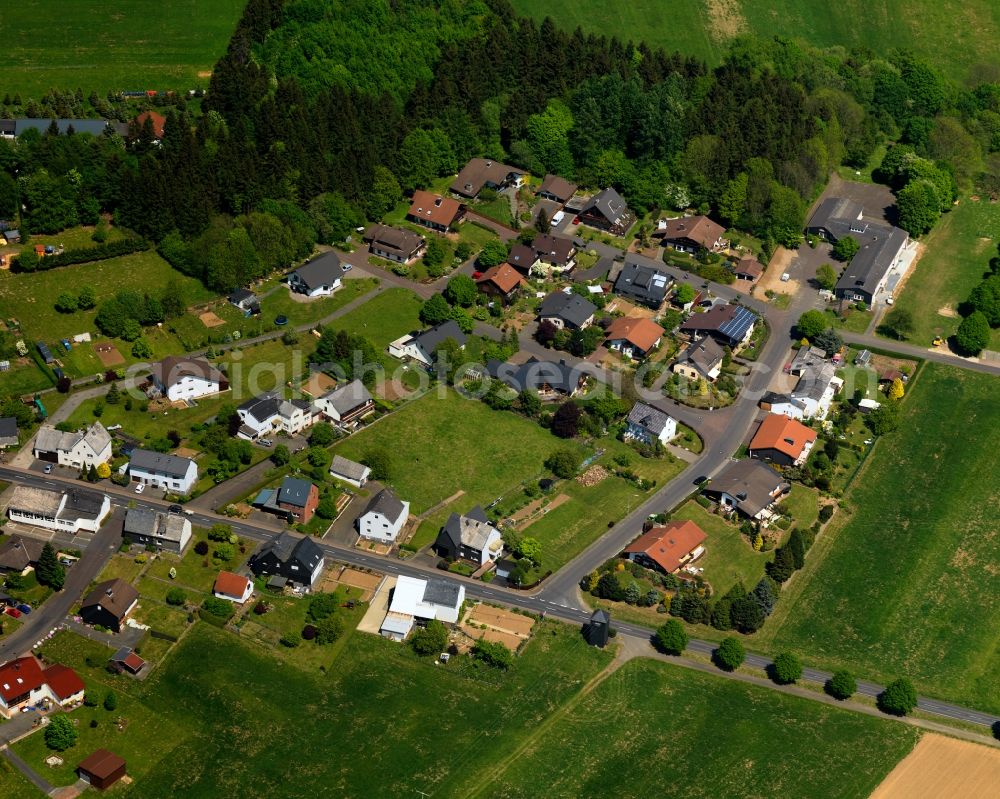 Aerial image Nisterau - View of the borough of Nisterau in the state of Rhineland-Palatinate. The borough is located in the county district and region of Westerwald. The residential village is surrounded by fields and meadows