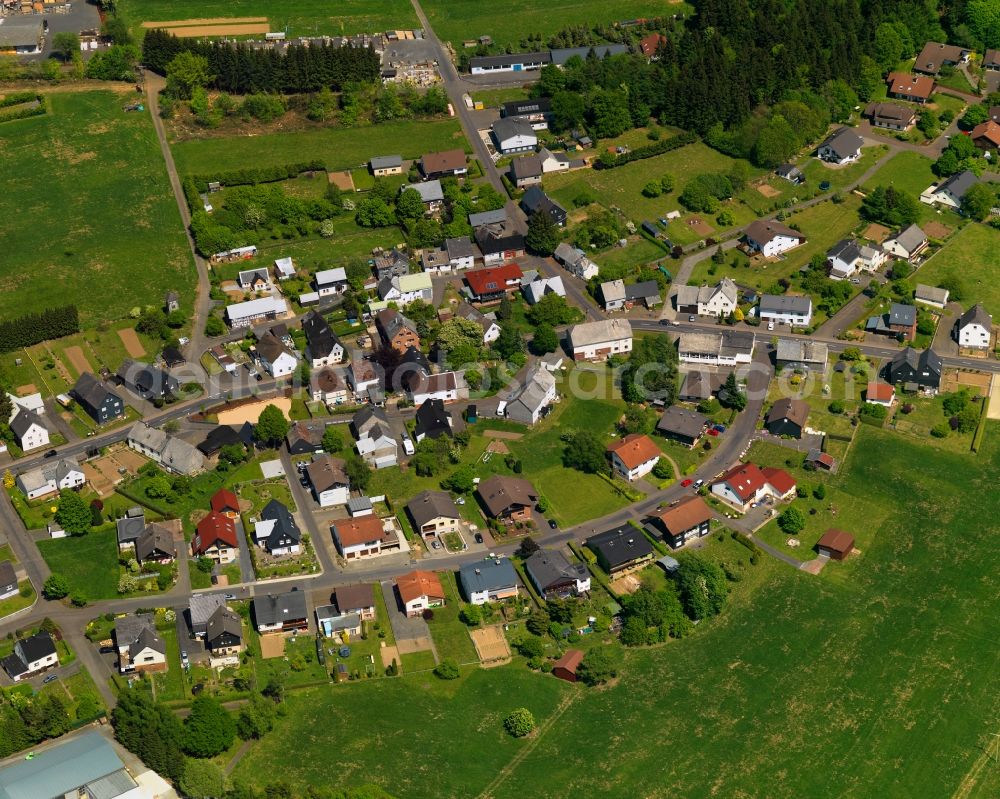 Aerial photograph Nisterau - View of the borough of Nisterau in the state of Rhineland-Palatinate. The borough is located in the county district and region of Westerwald. The residential village is surrounded by fields and meadows