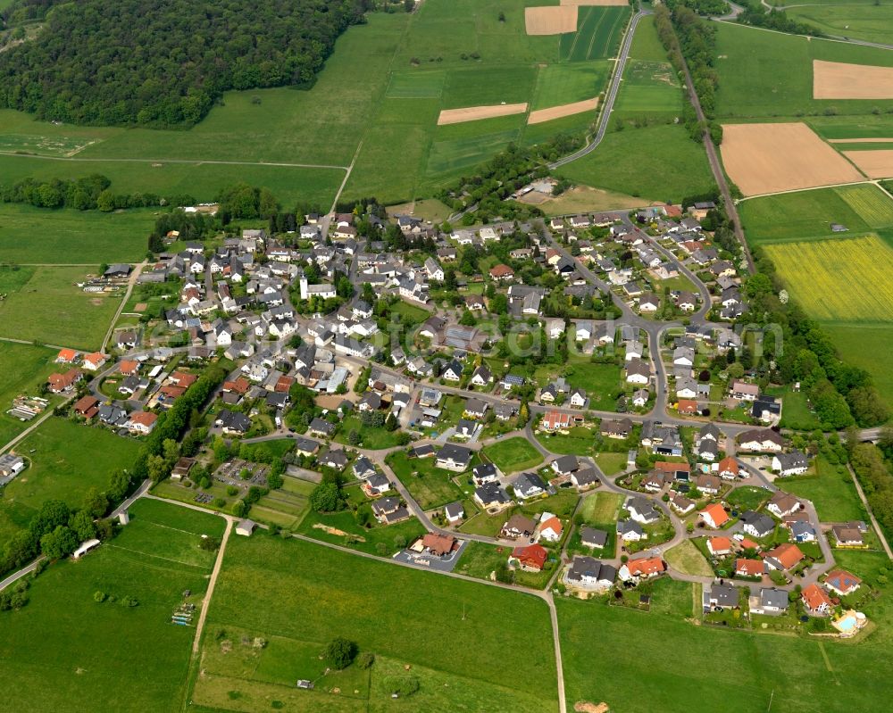 Aerial photograph Nordhofen - View of the borough of Nordhofen in the state of Rhineland-Palatinate. The borough and municipiality is located in the county district of Westerwaldkreis. The official tourist resort consists of residential areas and is surrounded by rapeseed fields and meadows