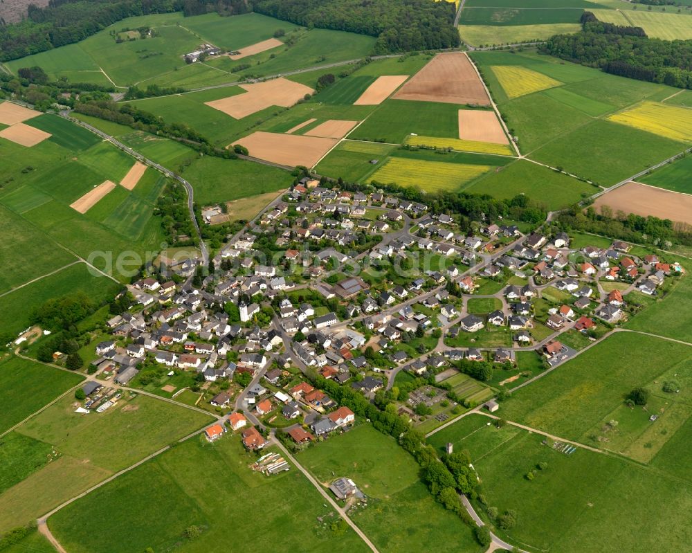 Nordhofen from above - View of the borough of Nordhofen in the state of Rhineland-Palatinate. The borough and municipiality is located in the county district of Westerwaldkreis. The official tourist resort consists of residential areas and is surrounded by rapeseed fields and meadows