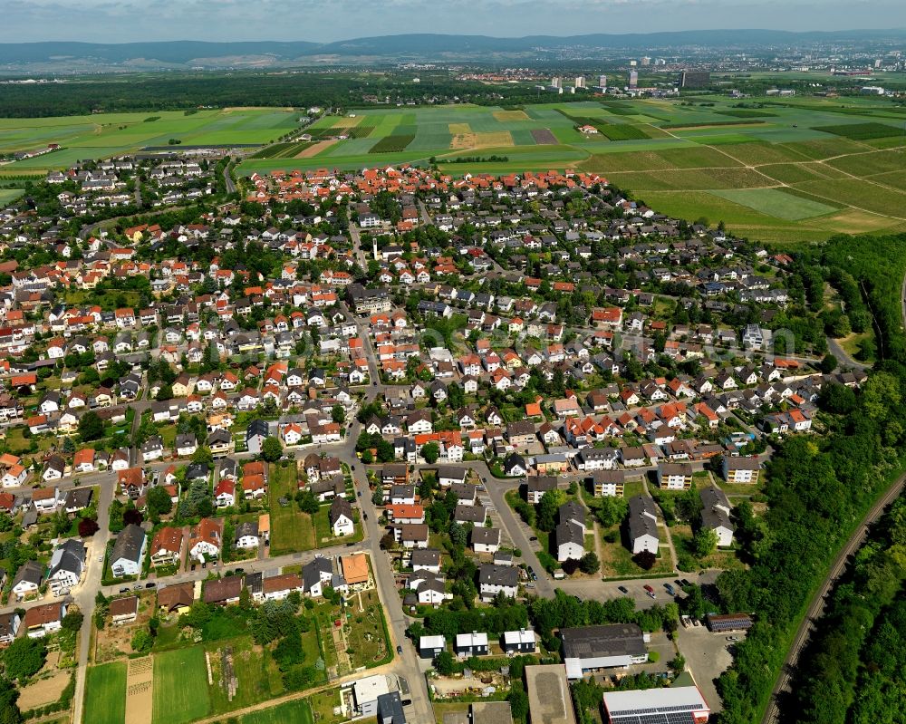 Ober-Olm from the bird's eye view: View of the borough of Ober-Olm in the state of Rhineland-Palatinate. The borough is located in the county district of Mainz-Bingen, on federal motorway A63. The residential village is surrounded by fields, vineyards and meadows