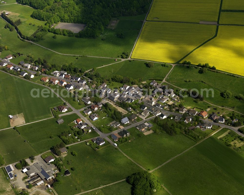 Aerial image Oberdürenbach - View of the borough of Oberduerenbach in the state of Rhineland-Palatinate. The borough is located in the East Eifel region, surrounded by fields, agricultural land and forest and mainly consists of residential buildings and agricultural businesses or farms