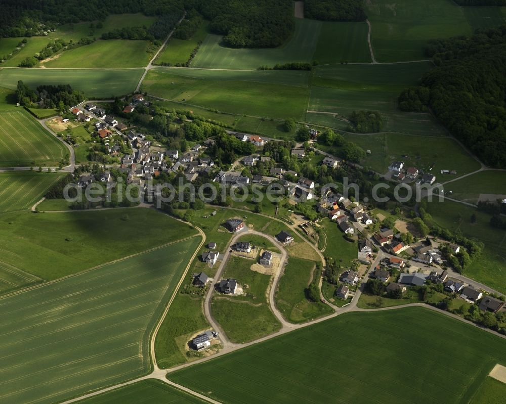 Aerial photograph Oberdürenbach - View of the borough of Oberduerenbach in the state of Rhineland-Palatinate. The borough is located in the East Eifel region, surrounded by fields, agricultural land and forest and mainly consists of residential buildings and agricultural businesses or farms