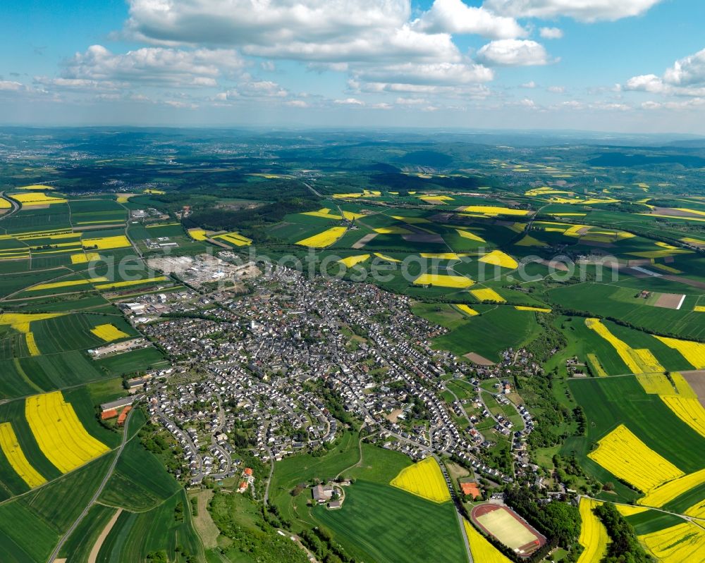 Ochtendung from the bird's eye view: View of Ochtendung in the state of Rhineland-Palatinate. The agricultural borough and municipiality is located in the county district of Mayen-Koblenz and surrounded meadows and rapeseed fields