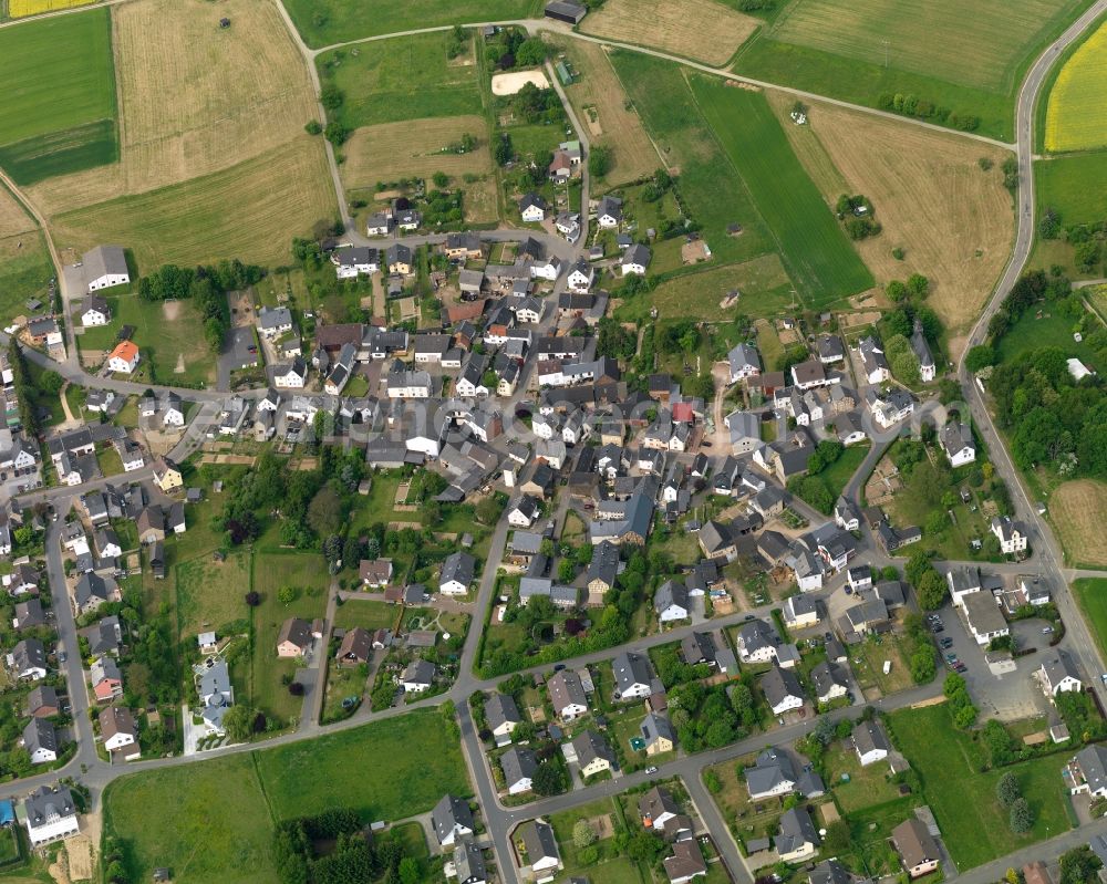 Aerial image Oelsberg - View of the borough of Oelsberg in the state of Rhineland-Palatinate. The borough and municipiality is located in the county district of Rhine-Lahn, in the North-Western Taunus mountain region. The agricultural village consists of residential areas and is surrounded by rapeseed fields and meadows