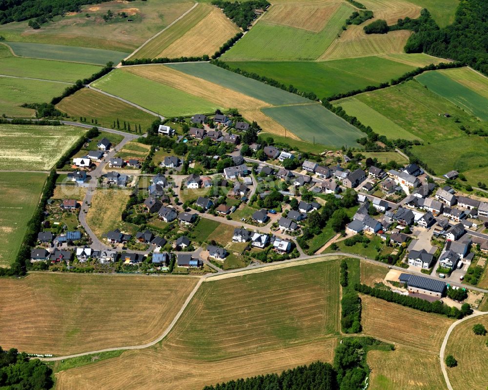 Perscheid from above - View of the borough of Perscheid in the state Rhineland-Palatinate. Perscheid is a village in the county district of Rhine-Hunsrueck. It is located on a crest in the East of the Hunsrueck mountain range, surrounded by fields and forest