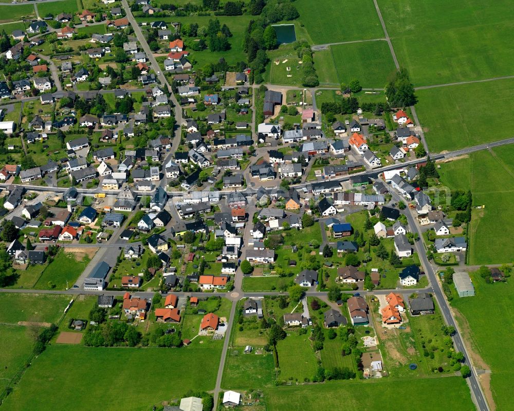 Rehe from the bird's eye view: View of the borough of Rehe in the state of Rhineland-Palatinate. The borough is located in the county district and region of Westerwald. The residential village is surrounded by fields and meadows and sits on federal highway B255