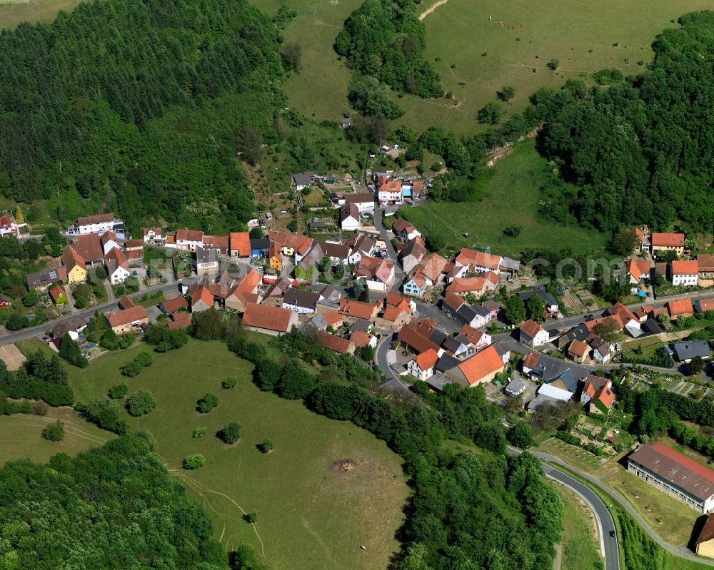 Aerial photograph Reiffelbach - View of the borough and municipiality of Reiffelbach in the state of Rhineland-Palatinate. The agricultural borough is located in the county district of Bad Kreuznach. Surrounded by fields, hills and forest, the village is located in the mountain range of Northern Palatinate - in the valley of the Reiffelbach creek