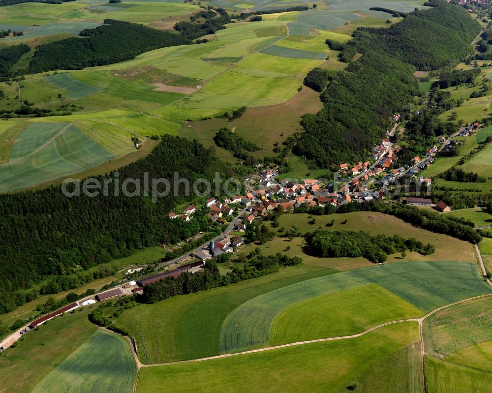 Reiffelbach from above - View of the borough and municipiality of Reiffelbach in the state of Rhineland-Palatinate. The agricultural borough is located in the county district of Bad Kreuznach. Surrounded by fields, hills and forest, the village is located in the mountain range of Northern Palatinate - in the valley of the Reiffelbach creek