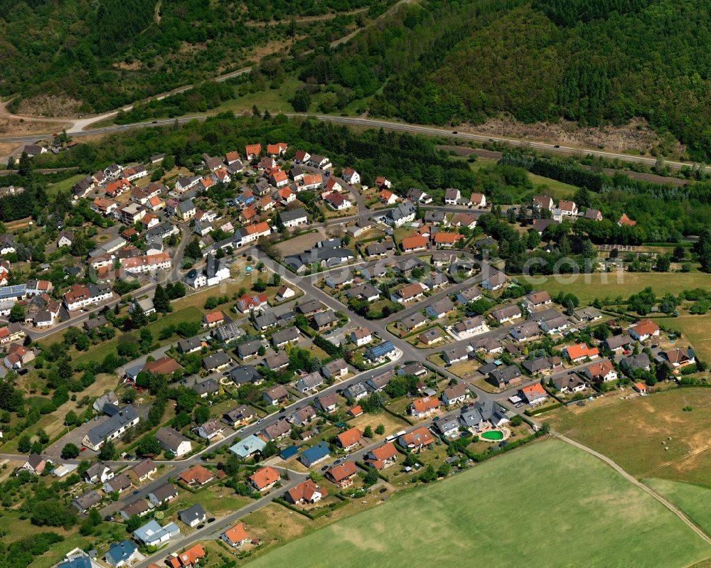 Ruschberg from the bird's eye view: View of Ruschberg in the state of Rhineland-Palatinate. Ruschberg is a borough and municipiality in the county district of Birkenfeld, in the region of the Westrich, Baumholder creek. The village is surrounded by hills, fields and vineyards and consists of several hamlets and residential areas