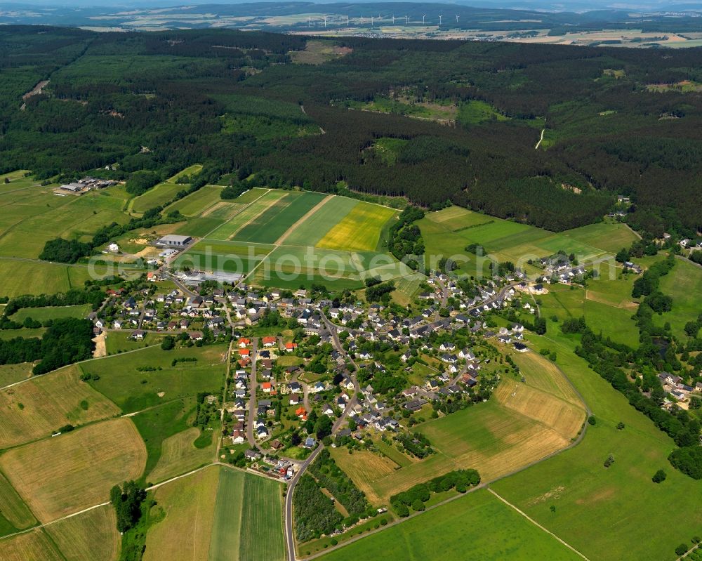 Schauren from above - View of Schauren in the state of Rhineland-Palatinate. The borough and municipiality is located in the county district of Birkenfeld, at Idar Forest in the Hunsrueck region. It is surrounded by agricultural land, meadows and forest. The hamlets Aschieder Mill and Schaurener Mill belong to the borough