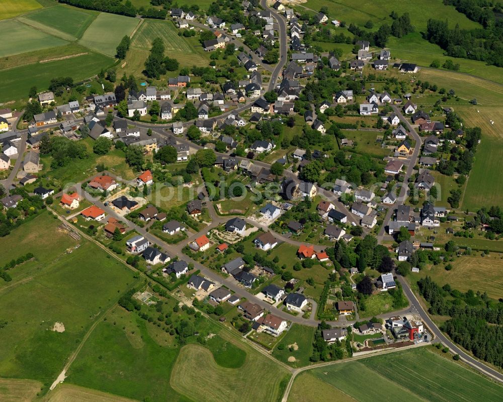 Schauren from the bird's eye view: View of Schauren in the state of Rhineland-Palatinate. The borough and municipiality is located in the county district of Birkenfeld, at Idar Forest in the Hunsrueck region. It is surrounded by agricultural land, meadows and forest. The hamlets Aschieder Mill and Schaurener Mill belong to the borough