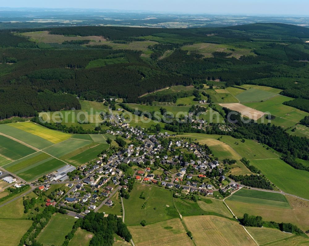 Schauren from above - View of Schauren in the state of Rhineland-Palatinate. The borough and municipiality is located in the county district of Birkenfeld, at Idar Forest in the Hunsrueck region. It is surrounded by agricultural land, meadows and forest. The hamlets Aschieder Mill and Schaurener Mill belong to the borough