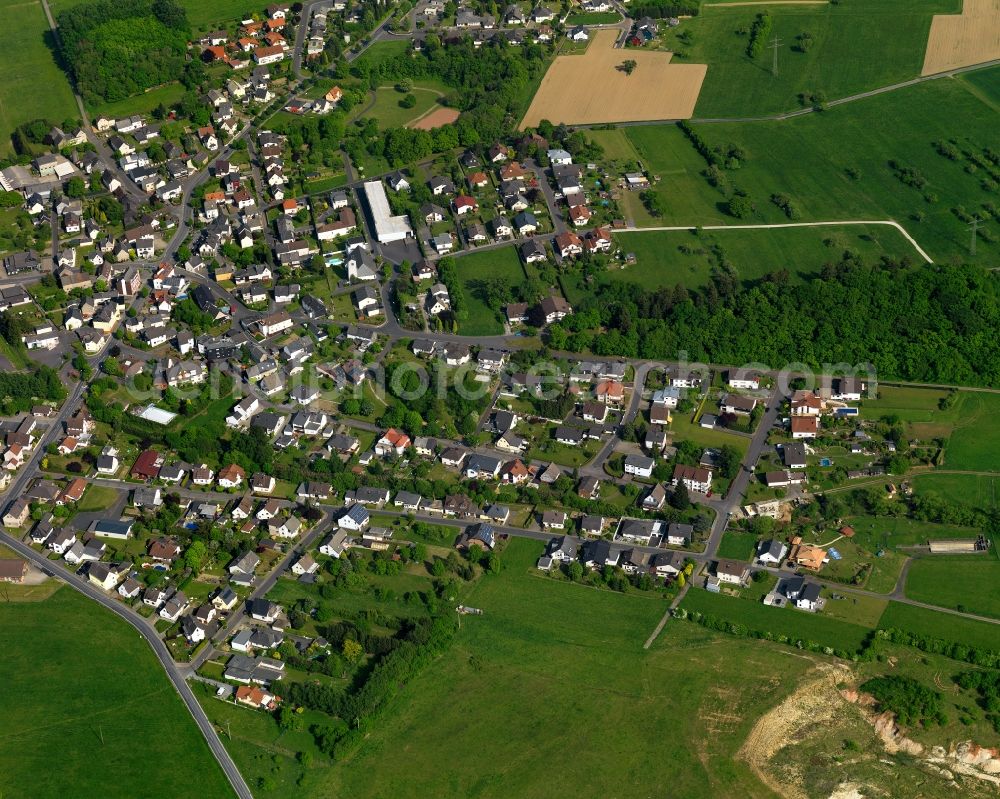 Staudt from above - View of Staudt in the state of Rhineland-Palatinate. The borough and municipiality is located in the county district of Westerwaldkreis in the low mountain range of Westerwald - the so called Kannenbaeckerland. Staudt is surrounded by agricultural land and meadows and located on the creeks Ahrbach and Kruemmelbach