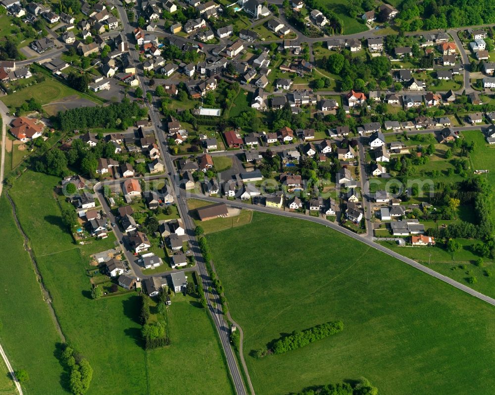 Staudt from the bird's eye view: View of Staudt in the state of Rhineland-Palatinate. The borough and municipiality is located in the county district of Westerwaldkreis in the low mountain range of Westerwald - the so called Kannenbaeckerland. Staudt is surrounded by agricultural land and meadows and located on the creeks Ahrbach and Kruemmelbach