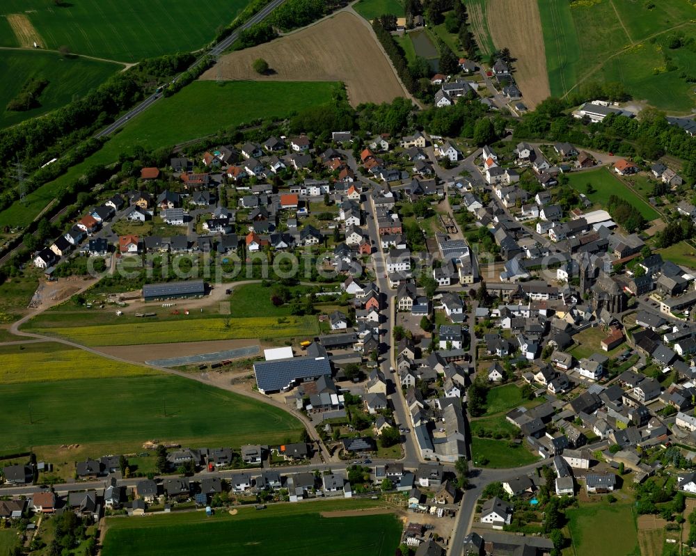 Aerial photograph Thür - View of Thuer in the state of Rhineland-Palatinate. The agricultural borough and municipiality is located in the county district of Mayen-Koblenz and surrounded by meadows and rapeseed fields. The boroughs of Regniarisbrunnen and Fraukirch belong to Thuer as well