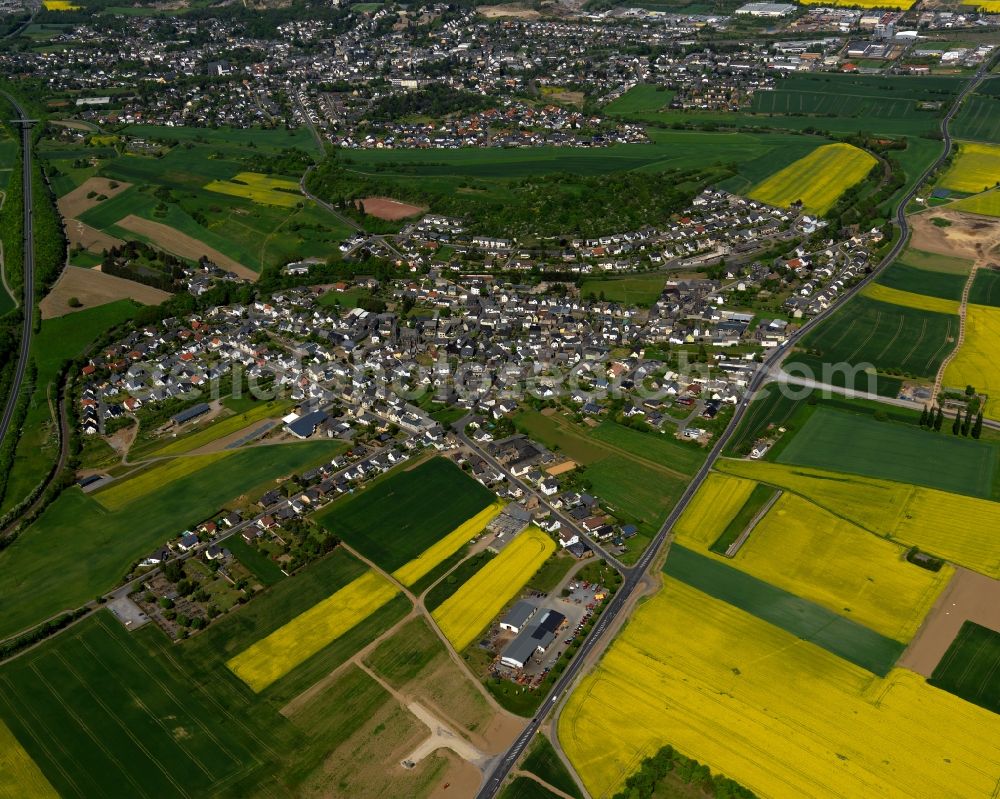 Thür from above - View of Thuer in the state of Rhineland-Palatinate. The agricultural borough and municipiality is located in the county district of Mayen-Koblenz and surrounded by meadows and rapeseed fields. The boroughs of Regniarisbrunnen and Fraukirch belong to Thuer as well