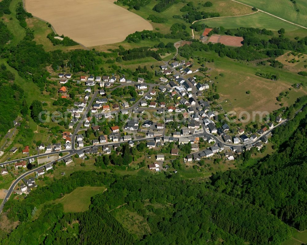 Aerial photograph Vollmersbach - View of Vollmersbach in the state of Rhineland-Palatinate. The borough and municipiality is located in the county district of Birkenfeld, in the protected landscape of Hochwald-Idarwald. It is surrounded by agricultural land, meadows and forest and consists of several hamlets and residential areas