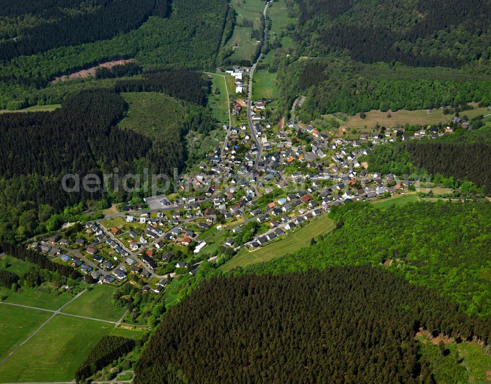 Weitefeld from above - View of Weitefeld in the state of Rhineland-Palatinate. The borough and municipiality Weitefeld is located in the county district of Altenkirchen in the Westerwald forest region and surrounded by fields, meadows and forest. It sits on a hill