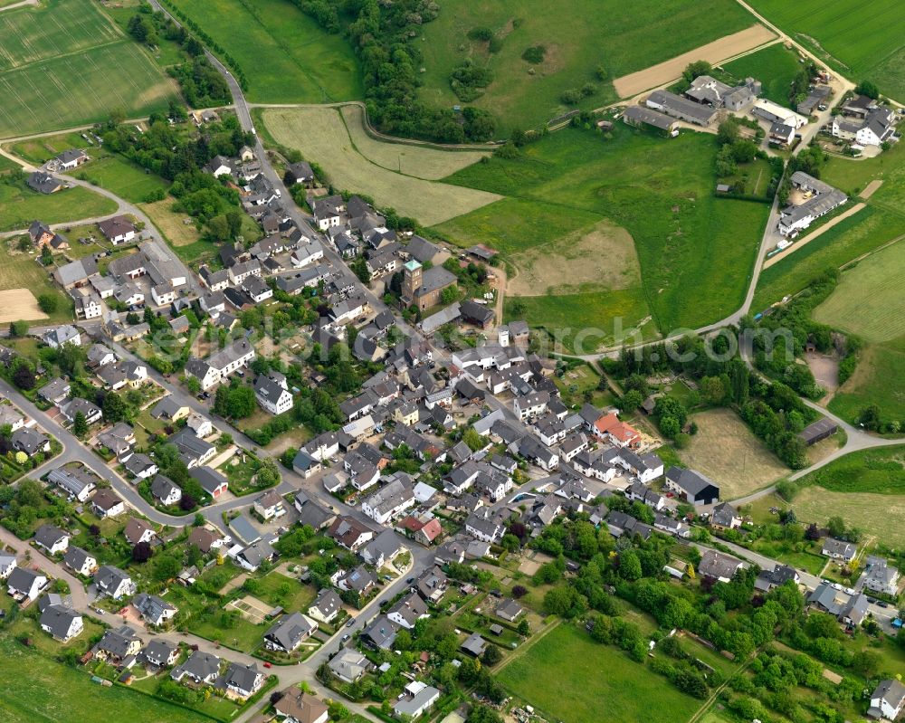 Aerial image Welterod - View of the borough of Welterod in the state of Rhineland-Palatinate. The borough and municipiality is located in the county district of Rhine-Lahn, in the Taunus mountain region. The agricultural village consists of residential areas and is surrounded by rapeseed fields and meadows