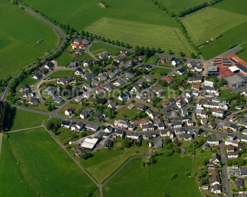 Winnen from the bird's eye view: View of the borough of Winnen in the state of Rhineland-Palatinate. The borough is located in the county district and region of Westerwald. The residential village is surrounded by fields and meadows