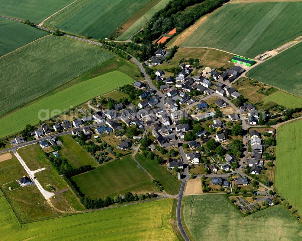 Wirfus from above - View of Wirfus in the state of Rhineland-Palatinate. The borough and municipiality is located in the county district of Cochem-Zell on the edge of the Eifel Region. Wirfus is surrounded by agricultural land and meadows and is located in a valley of Pommerbach creek