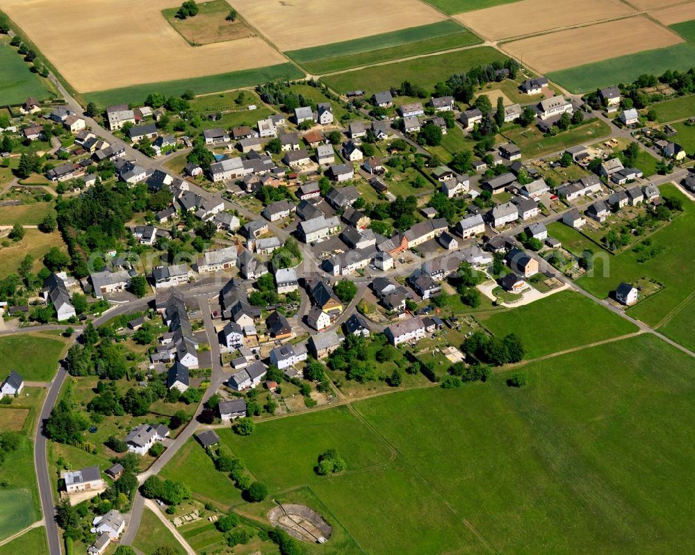 Wirschweiler from above - View of Wirschweiler in the state of Rhineland-Palatinate. The borough and municipiality is an official tourist resort and located in the county district of Birkenfeld, in the Nature Park Saar-Hunsrueck. It is surrounded by agricultural land, meadows and forest and includes the hamlets Klarebacherhof and Wirschweiler Mill