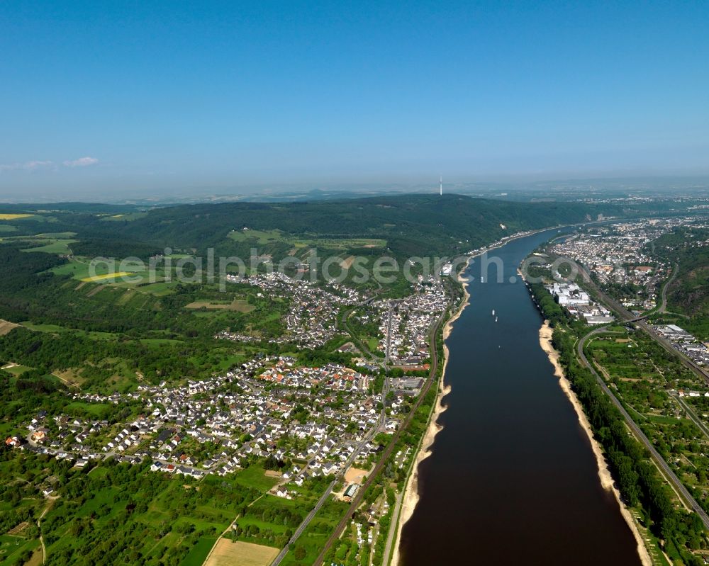 Aerial photograph Brey - View of Brey and Rhens in the state of Rhineland-Palatinate. The boroughs and municipialities are official tourist resorts and located in the county district of Mayen-Koblenz on the left riverbank of the river Rhine, surrounded by hills, forest and fields. The industrial area of Braubach is located on the opposite riverbank