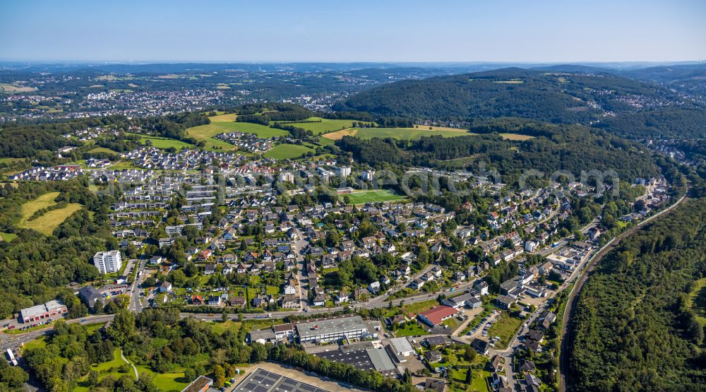 Ennepetal from the bird's eye view: Town View of the streets and houses of the residential areas and the sports ground of the Sportverein Buettenberg 1930 e.V. in the district Buettenberg in Ennepetal in the state North Rhine-Westphalia, Germany