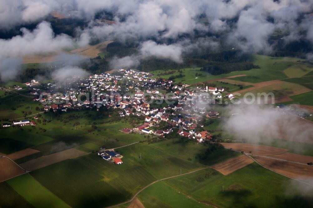 Aerial photograph Immendingen - Town View of the streets and houses of the residential areas in the district Hattingen under low clouds in Immendingen in the state Baden-Wuerttemberg