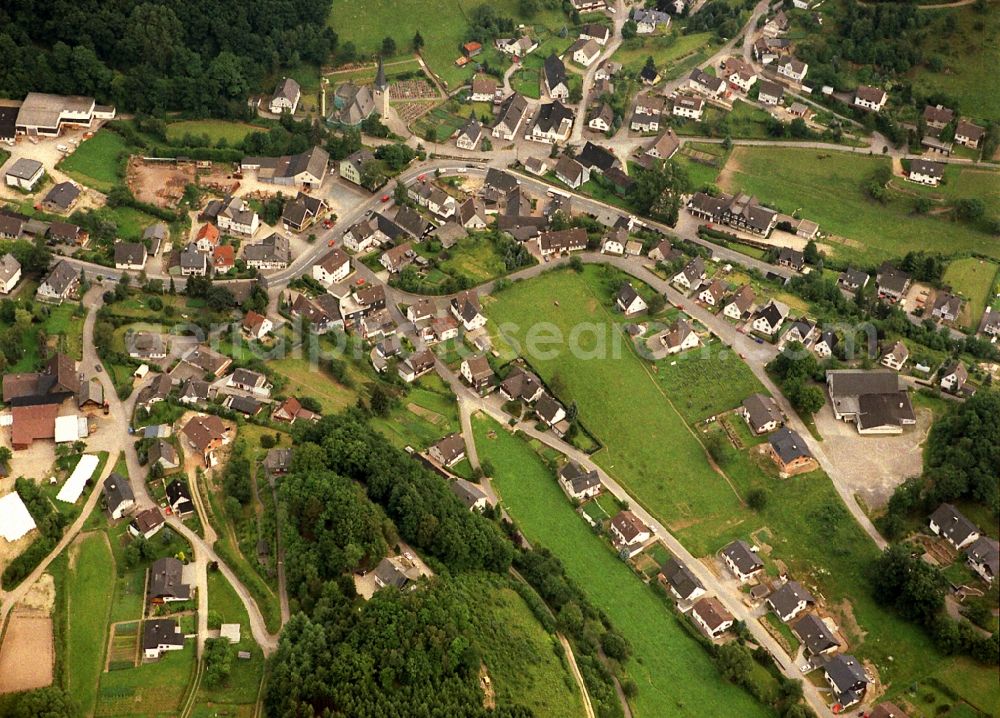 Aerial image Lennestadt - Town View of the streets and houses of the residential areas in the district Kirchveischede in Lennestadt in the state North Rhine-Westphalia