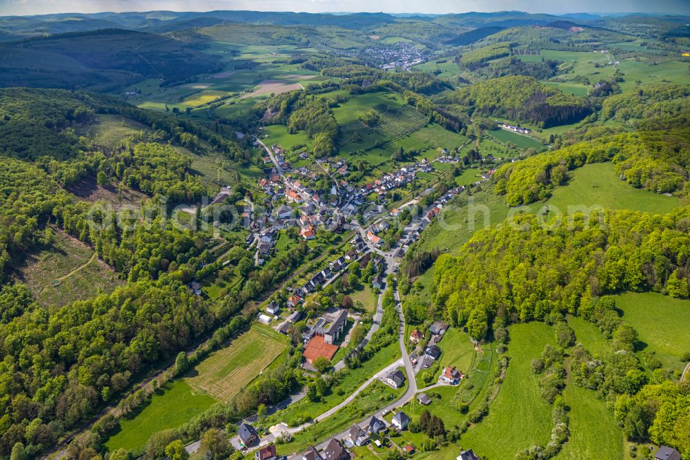Aerial image Brilon - Town View of the streets and houses of the residential areas in the district Messinghausen in Brilon in the state North Rhine-Westphalia