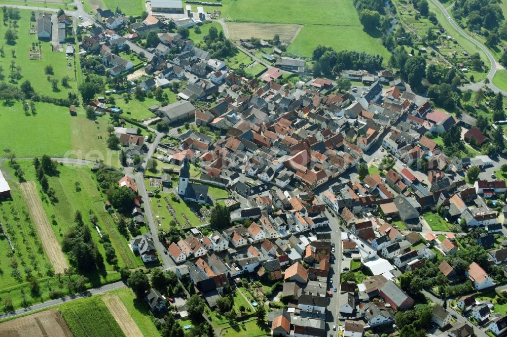 Lich from above - Town View of the streets and houses of the residential areas in the district Muschenheim in Lich in the state Hesse, Germany