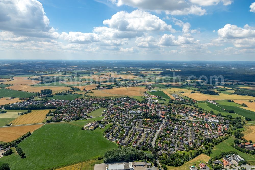 Aerial image Sendenhorst - Town View of the streets and houses of the residential areas in the district Storp in Sendenhorst in the state North Rhine-Westphalia, Germany