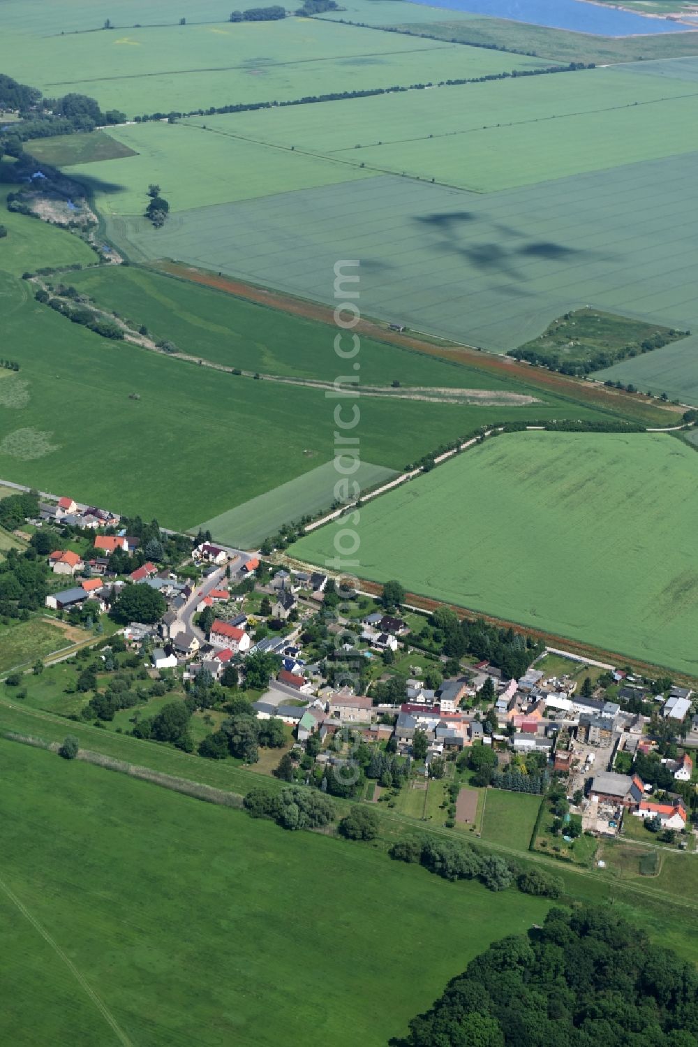 Aerial image Nienburg (Saale) - Town View of the streets and houses of the residential areas in the district Wispitz mit umgebenden Feldern in Nienburg (Saale) in the state Saxony-Anhalt