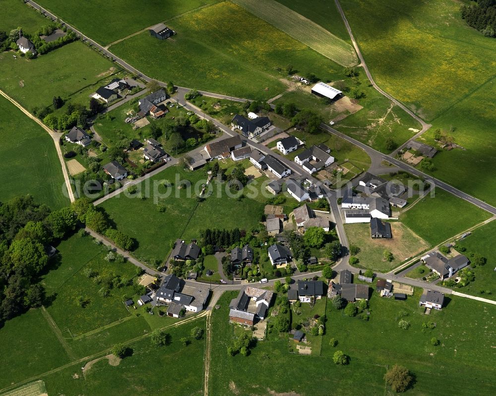 Aerial image Hümmel - View of the Pitscheid part of the borough of Huemmel in the state of Rhineland-Palatinate. Blindert is located on the border to North Rhine-Westphalia and consists of several farms and single family homes, surrounded by forest and fields